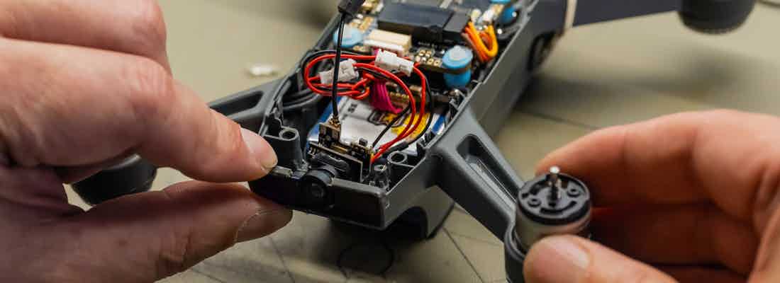 Engineer repairing a drone