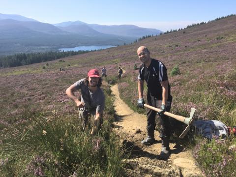 Volunteers working on path repair